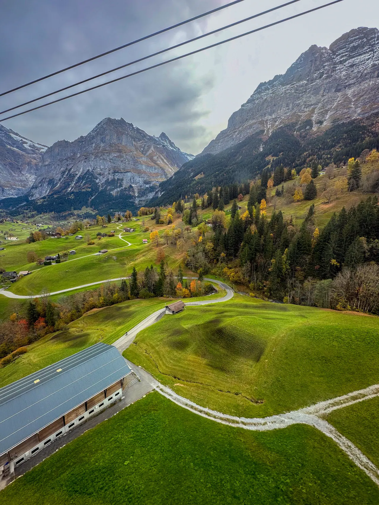 An autumn valley unfolding beneath the Jungfrau massif