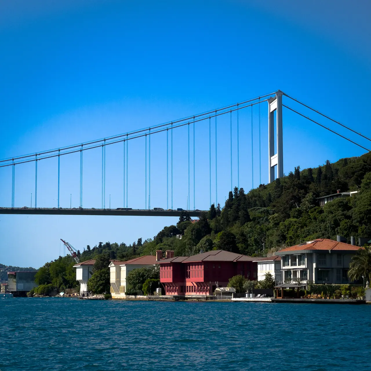 The Bosphorus suspension bridge crossing a blue sky